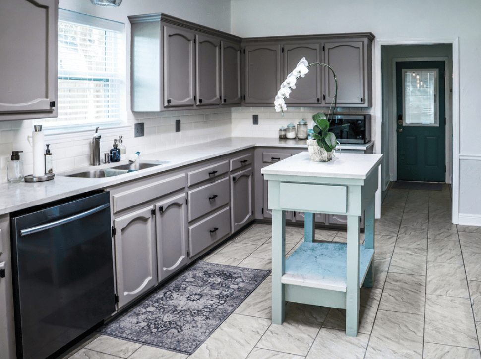 A refinished New Orleans kitchen with painted cabinetry