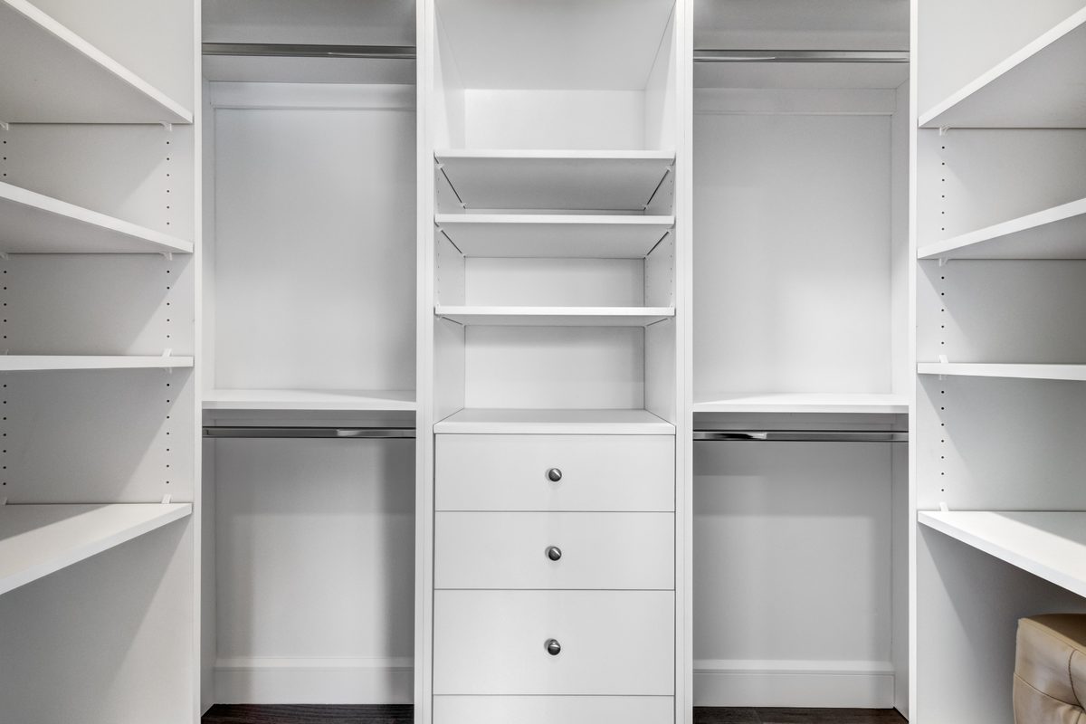 A renovated closet with open shelving and airflow gaps